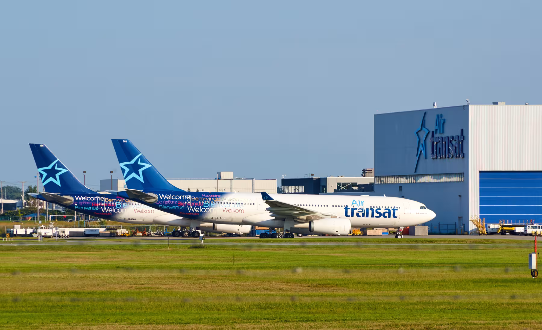Air Transat aircraft in front of hangar