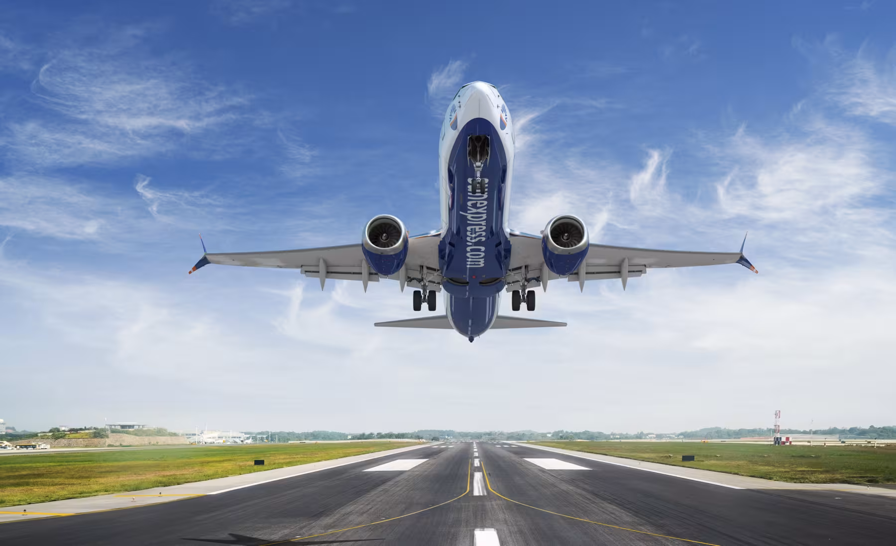Aicraft with SunExpress livery taking off the runway